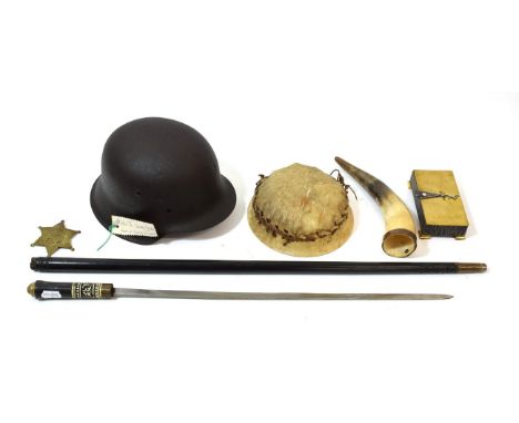Militaria, comprising the shell to a Second World War German M42 combat helmet, with note attached stating it was found at Fa