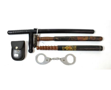A Victorian Ebonised Walnut Police Truncheon, the body painted with a crown over the Royal Coat of Arms and VR cypher in colo