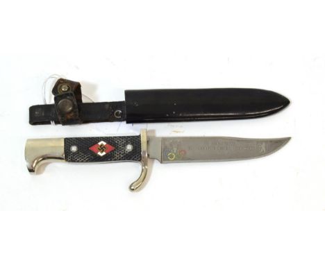 A Hitler Youth 1936 Olympic Presentation Knife, one side of the 10.5cm clip point steel blade etched and enamelled with an ea