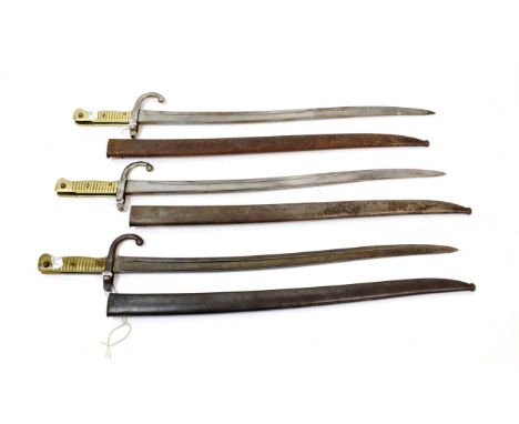 Three French Model 1866 Chassepot Yataghan Sword Bayonets, each with T section steel blade, the back edge engraved with manuf