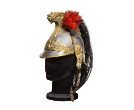 A French Model 1874 Cuirassier Helmet, with steel skull, the brass comb embossed with beaded fluting and terminating with the