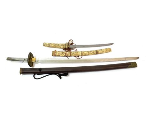 A Japanese Wakizashi, with 33cm blade, the bone hilt and saya carved with panels of figures, 57.5cm; a Chinese Copy of a Japa