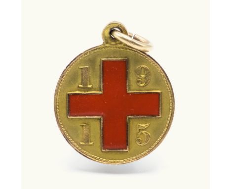 A 9ct gold and enamel Guernsey Red Cross medal / pendent, the obverse with central enamelled Red Cross flanked in the corners