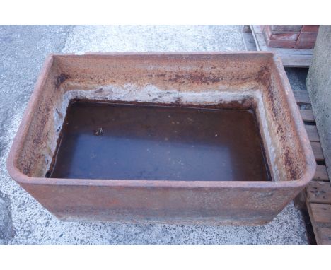 19th century D shaped cast iron trough with rolled rim, W94cm, H38cm, D60cm