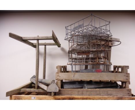 Four vintage galvanised bottle crates, four feed troughs, two agricultural trays, and feed gate Condition Report Click here f