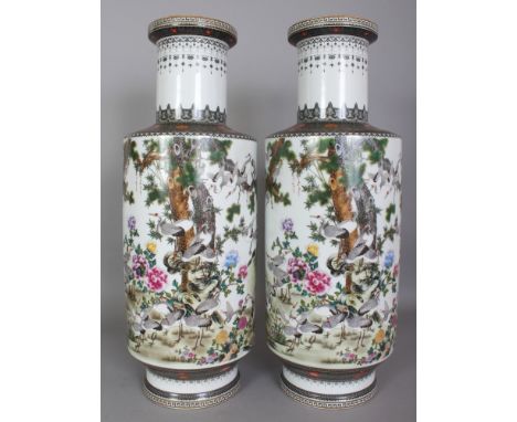 A LARGE PAIR OF GOOD QUALITY CHINESE REPUBLIC STYLE PORCELAIN ROULEAU VASES, each decorated with a detailed scene of a multit