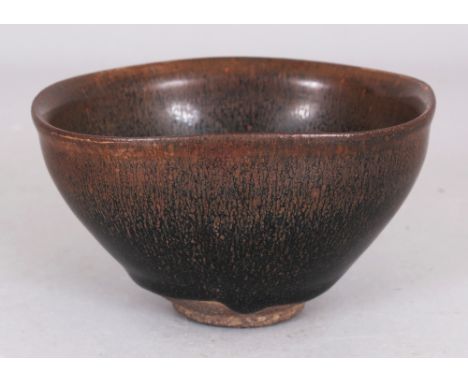 A CHINESE SONG STYLE JIAN WARE HARE'S FUR CERAMIC BOWL, the unglazed base with an incised mark, 4.75in wide at widest point &