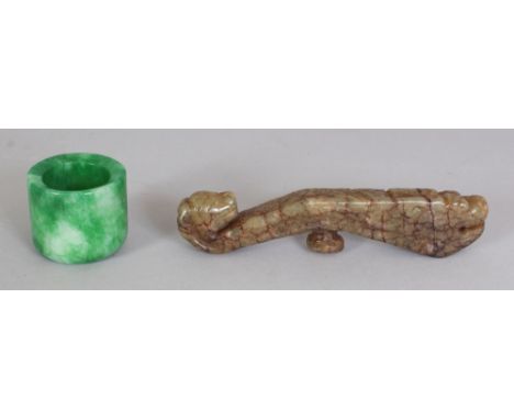 A CHINESE JADE BELT HOOK, of archaic design, 4.25in; together with an apple-green archer's ring, 1.3in diameter & 1.1in long.