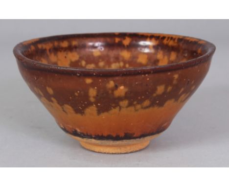 A SONG STYLE JIAN WARE BROWN GLAZED OIL SPOT CERAMIC BOWL, the glaze falling well short of the foot, 4.75in diameter & 2.3in 