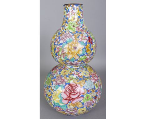 A CHINESE CANTON ENAMEL MILLEFLEUR DOUBLE GOURD VASE, 13.1in high.