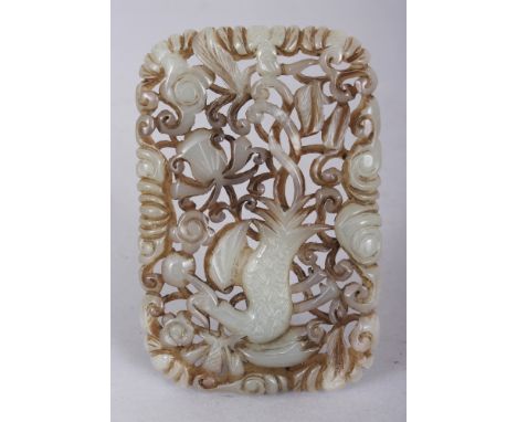 A CHINESE PIERCED JADE-LIKE PHOENIX PLAQUE, of rectangular form with rounded corners, 3.75in x 2.5in.