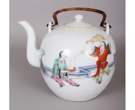 A LARGE EARLY 20TH CENTURY CHINESE FAMILLE ROSE GLOBULAR PORCELAIN TEAPOT & COVER, painted with playing youths and children i