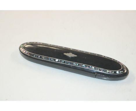 A black lacquered and mother of pearl inlaid spectacles case 