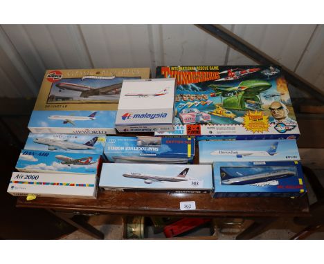 A quantity of model aircraft; an as new Air Fix Classic Airliners model; and a Thunderbirds International Rescue game 