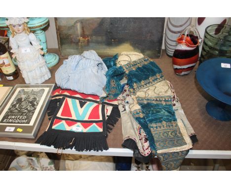 A small collection of various vintage clothing and textiles