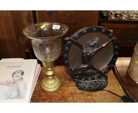 An Art Deco style table lamp and a glass candle holder 