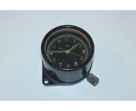 A WWII 1941 8 day cockpit clock marked to dial, possibly of Spitfire or Hurricane interest 