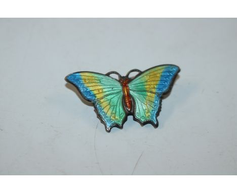 A silver enamel decorated butterfly brooch 