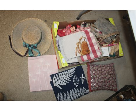A box of various textiles; broad rimmed hat etc.
