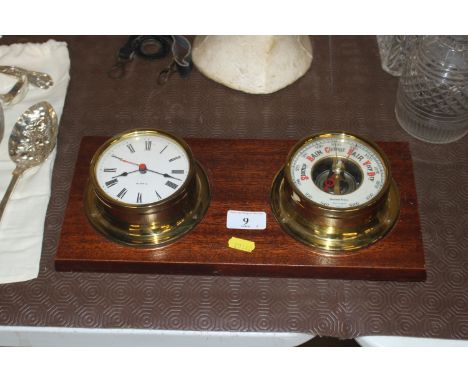 A ships style brass clock and barometer set 