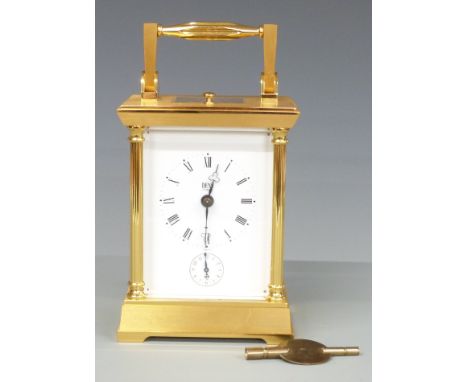 Dent of London 20thC brass carriage clock, with reeded pillars to corners, enamelled Roman dial with secondary alarm dial and