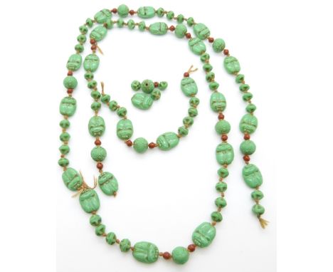 A ceramic necklace made up of scarab beetle beads&nbsp;