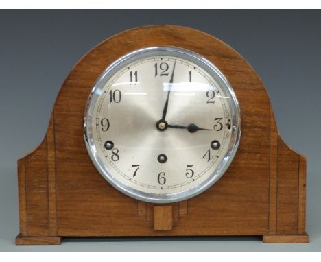 An oak cased mantel clock by Garrard, Westminster chimes, 23cm tall&nbsp;