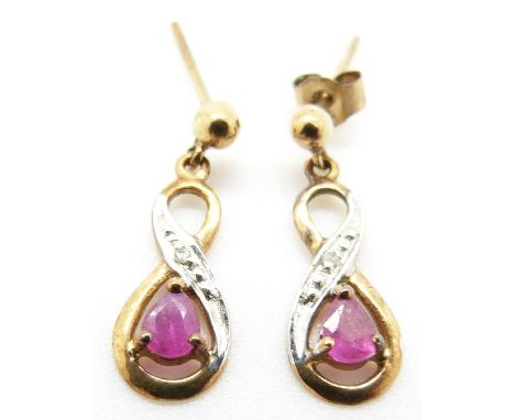 A pair of 9ct gold earrings set with a pink sapphire and a diamond to each, 1g