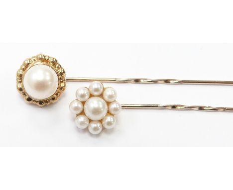 Two 9ct gold stick pins set with pearls