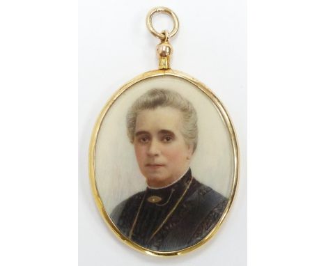 Edwardian 15ct gold double sided locket set with painted ivory portrait miniatures, one side a lady, verso a gentleman (possi