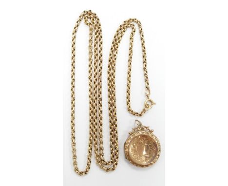 A 9ct gold Victorian guard chain with a 9ct gold back and front locket&nbsp;
