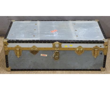 A metal bound and riveted flight case/trunk, H35 x W100 x D50cm