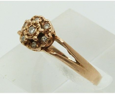 A 14ct rose gold ring set with diamonds (size N)