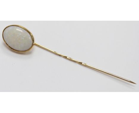 A stick pin set with an oval opal cabochon&nbsp;