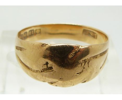 An 18ct gold keeper ring, Birmingham 1914, 3.7g (size O)