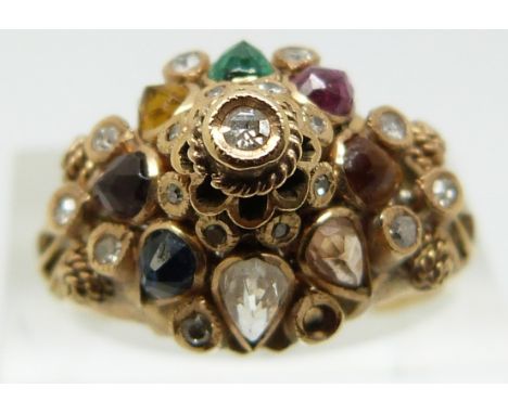 A 18ct gold ring set with diamonds, a pink sapphire, emerald, tigers eye, garnet, citrine, topaz etc (size P)