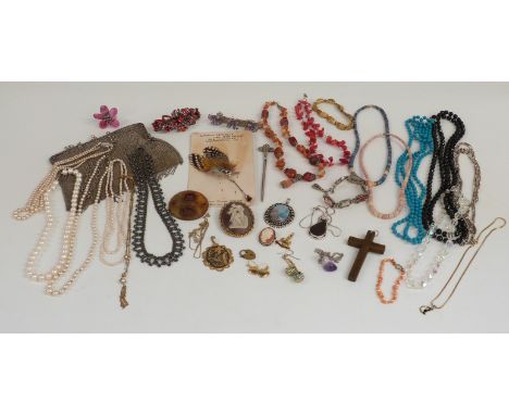 A collection of costume jewellery including necklaces, silver cameo, silver pendant, pearl necklace etc&nbsp;