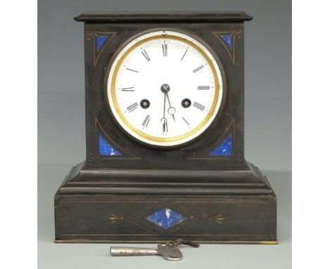 A black slate mantel clock with inlaid lapis lazuli or similar and two train movement striking on a gong, 21cm tall&nbsp;