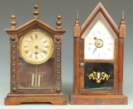 Wurttemberg mantel clock with carved case and Roman dial, together with a steeple clock with alarm facility and Roman printed