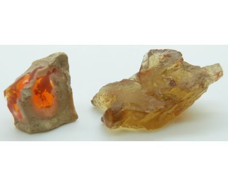 A sample of fire opal boulder (2.2g) and a chrysoberyl crystal (6.4g)