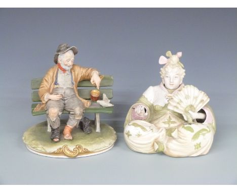 Art Deco nodding ceramic figure with waving hand and fan in the Oriental style, and a Capodimonte figure of a man feeding pig