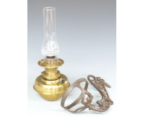 Brass oil lamp with a cast iron wall bracket&nbsp;