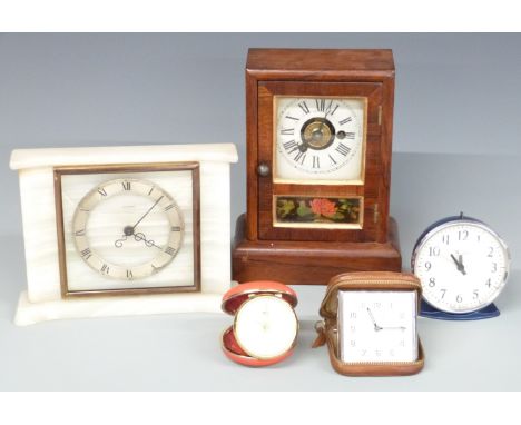Seth Thomas Connecticut 19th century mantel alarm clock together with three mid twentieth examples including Smiths travel et
