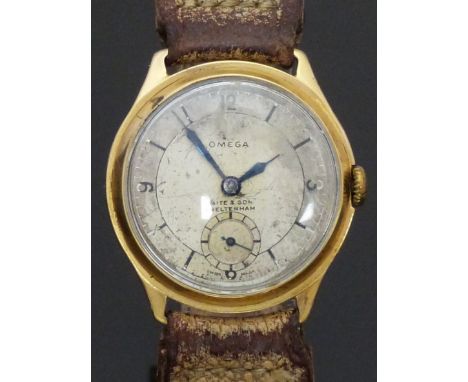 Omega 9ct gold gentleman's wristwatch with inset subsidiary seconds dial, blued hands, silver dial and signed 15 jewel moveme