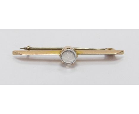 A 9ct gold brooch set with a moonstone cabochon