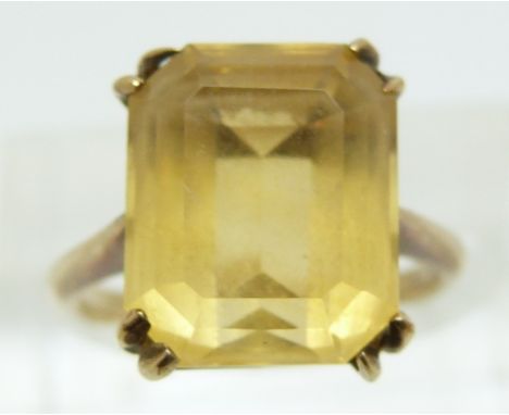 A 9ct gold ring set with an emerald cut citrine, 3.7g (size K)&nbsp;