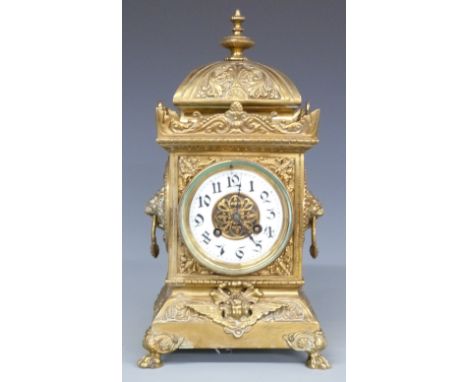 Japy Freres late 19thC brass mantel clock in ornate brass case with lion masked cherub decoration, the Arabic enamelled chapt