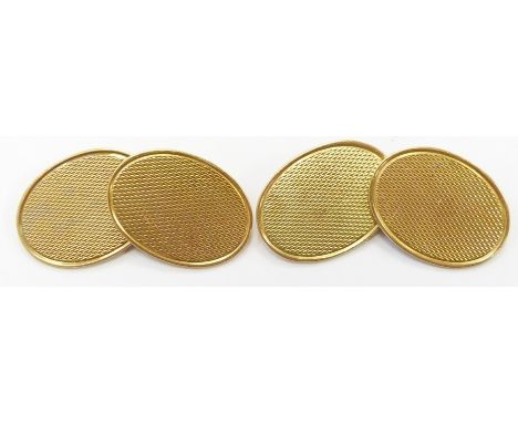 A pair of 18ct gold cufflinks with engine turned decoration, 10.4g