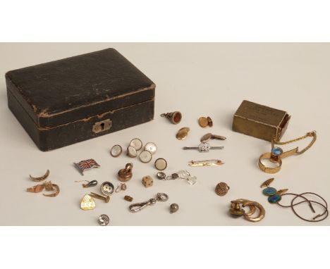 An 18ct gold cufflink (5.5g), 9ct gold brooch (1.2g), two sections of Victorian rings (3.2g), a pair of enamel cufflinks, foi