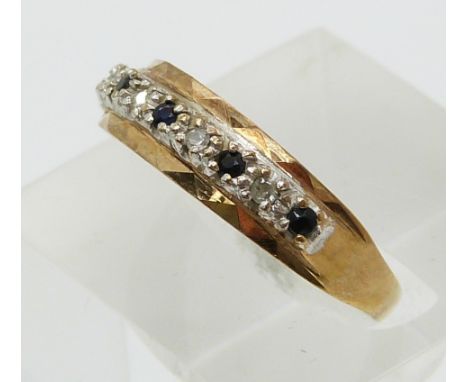 A 9ct gold ring set with sapphires and diamonds (size O)